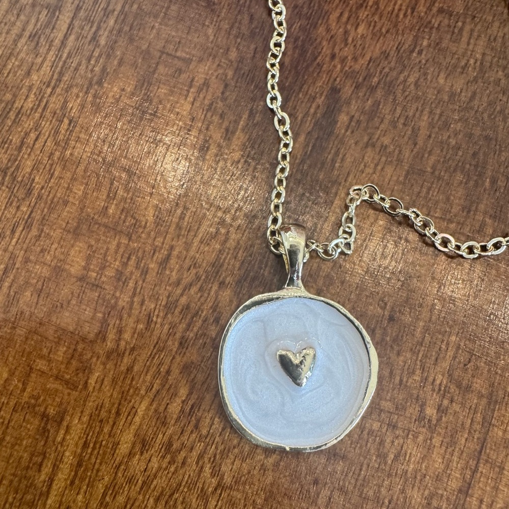 Kinsley Armelle
White and Gold; Heart in Circle Necklace